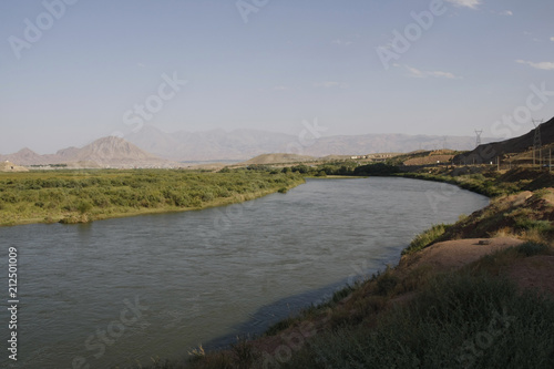 Aras river flowing along the Iranian-Azerbaijan border photo