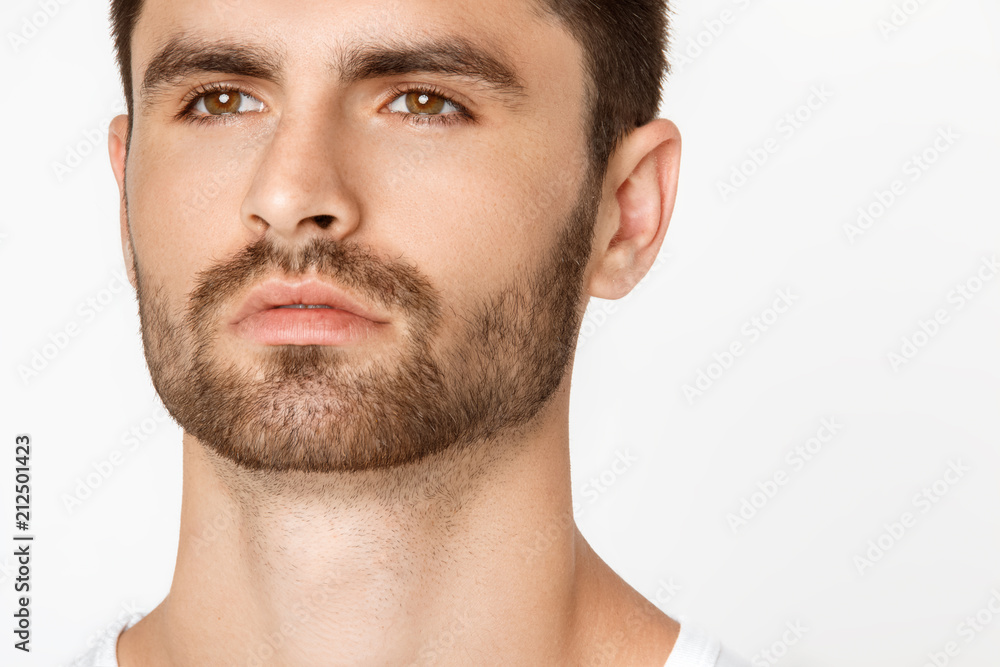 Obraz premium Strong stripped male model in black underwear on white background