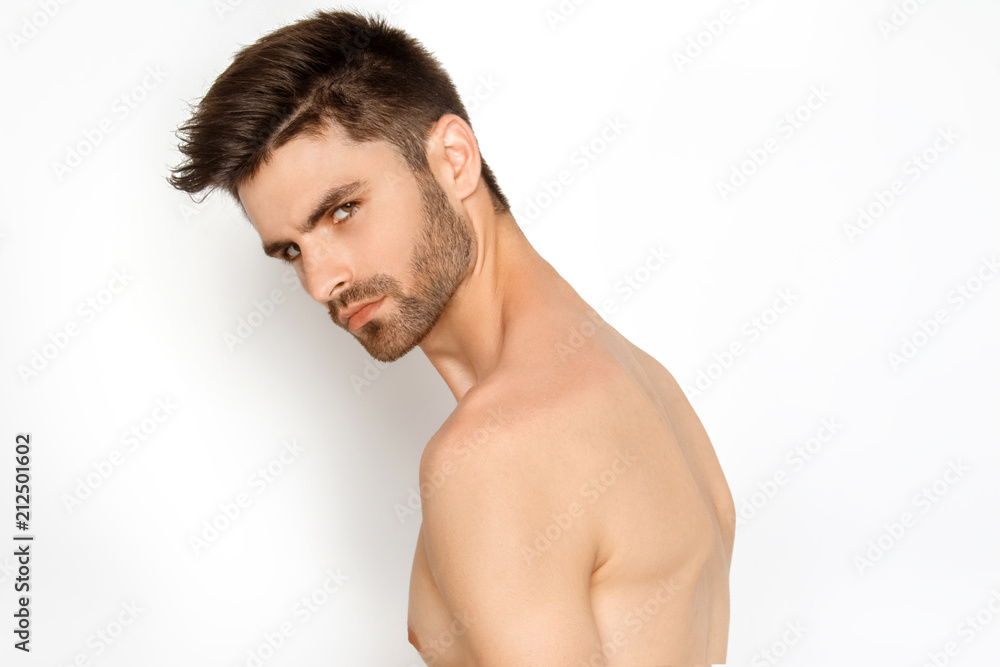 Strong stripped male model in black underwear on white background Strong stripped male model in black underwear on white background
