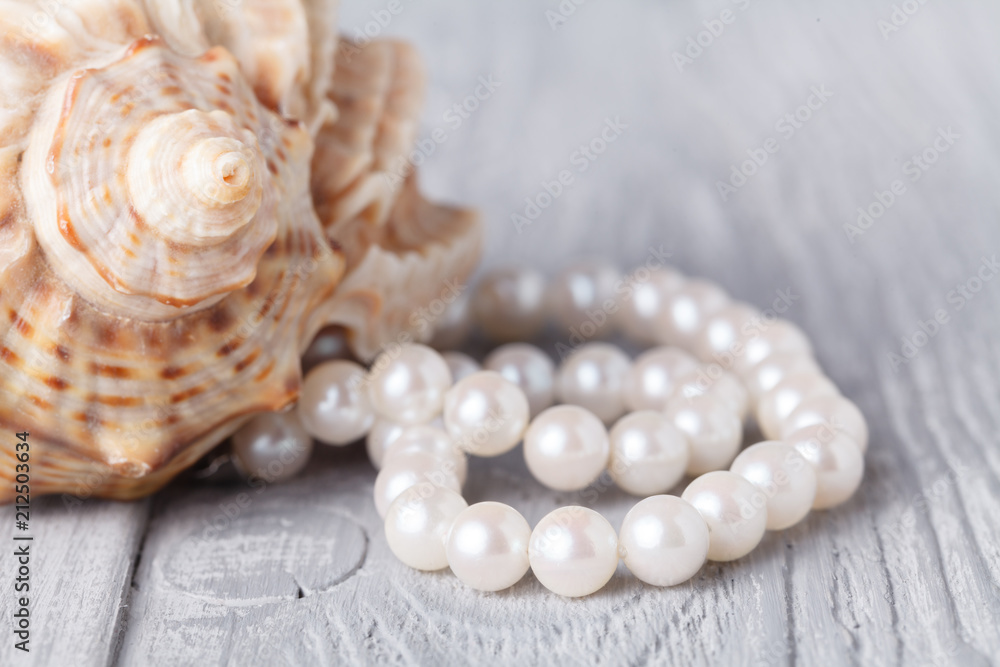 Wedding background with pearls and sea shell. Wedding background with pearls and sea shell.