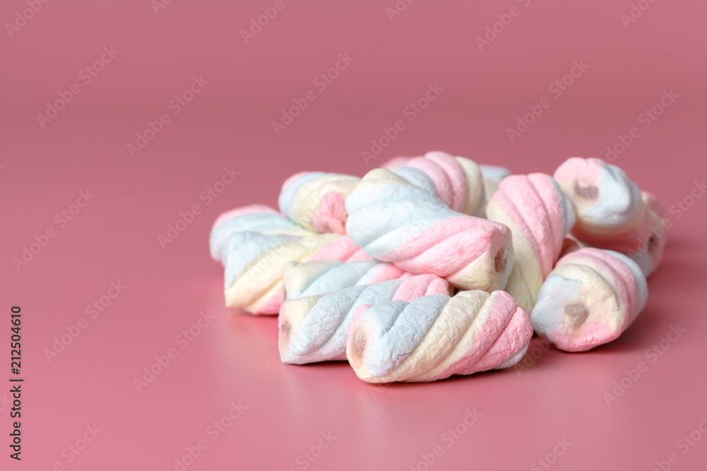 Twisted american marshmallow on pink background