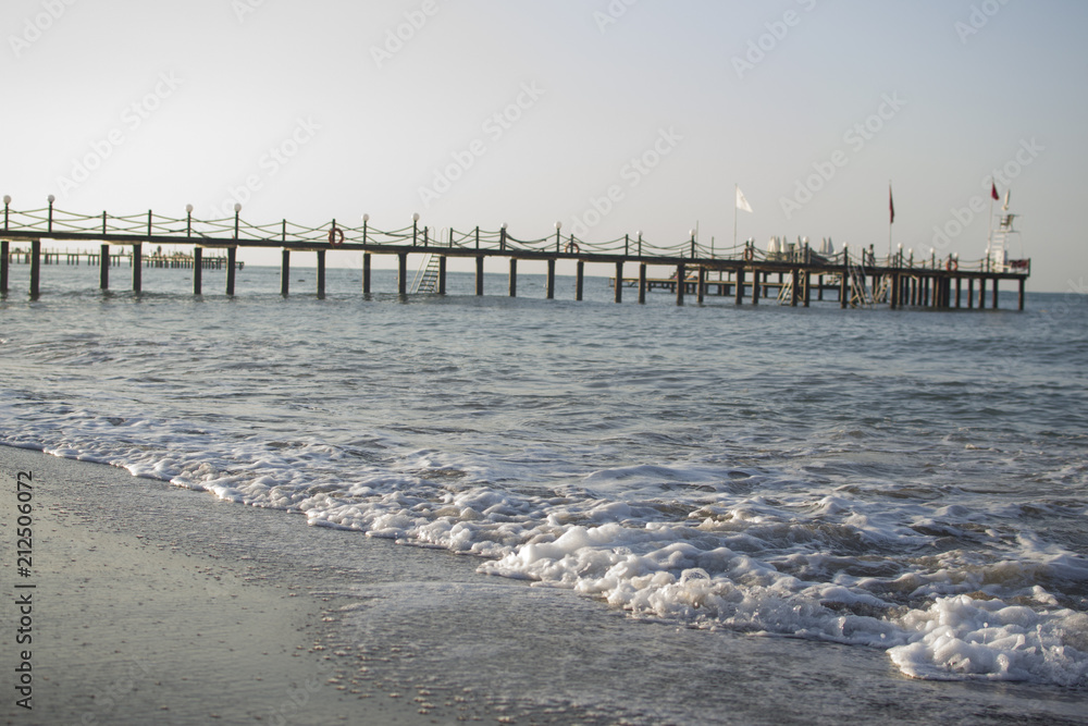 view of the waves and the pier