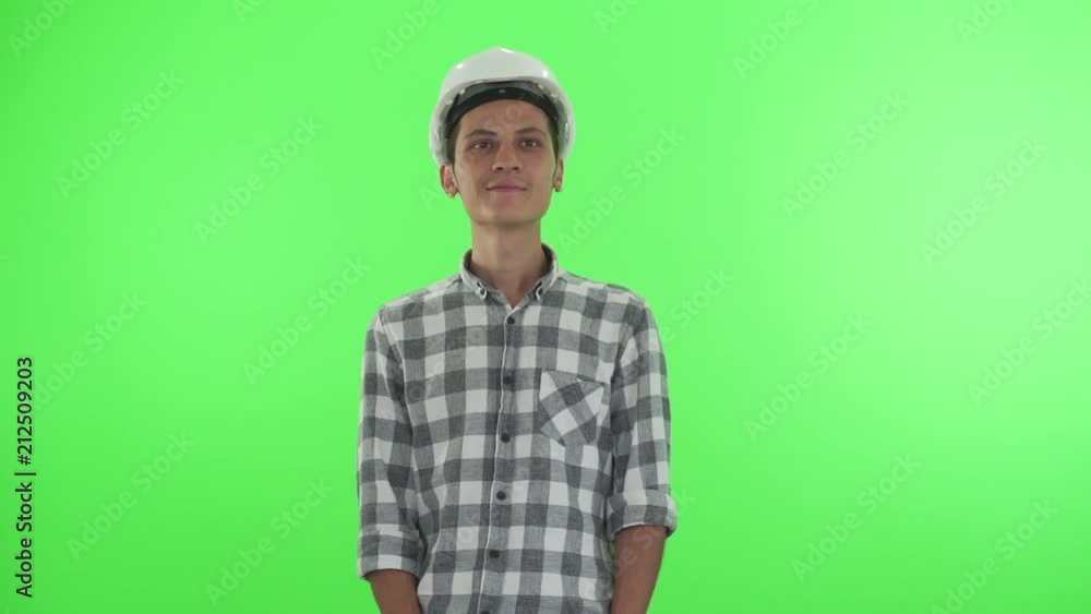 Young architect on a green chroma key Young architect on a green chroma key