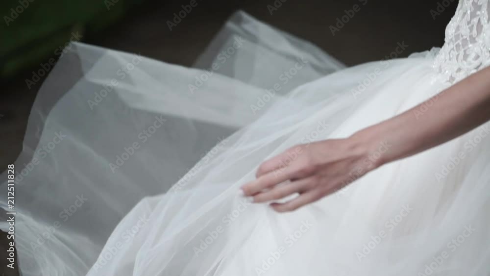 Young bride circling in park slowmotion Young bride circling in park slowmotion
