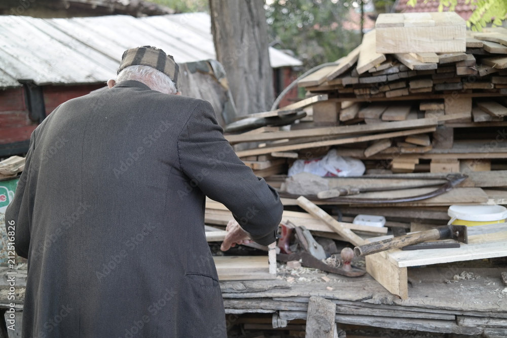 working grandfather, woodcutter working grandfather, woodcutter