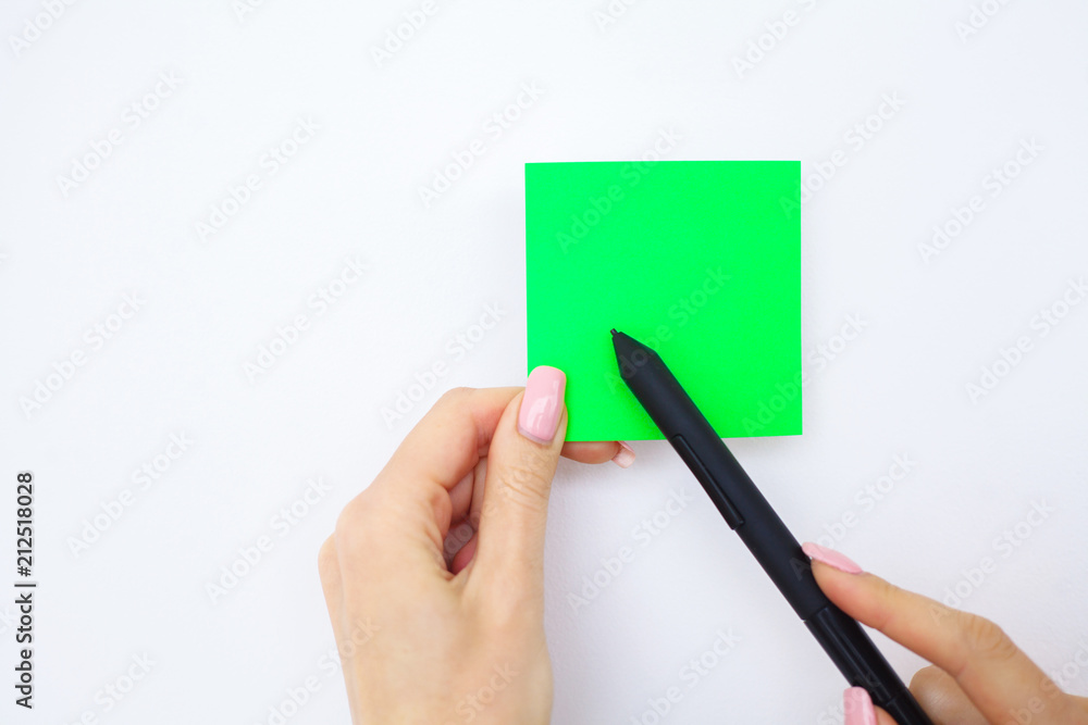 Blank Folder with Green Paper. Hand that Holding Folder and Pan Handle on White Background. Copyspace. Place for Text Blank Folder with Green Paper. Hand that Holding Folder and Pan Handle on White Background. Copyspace. Place for Text
