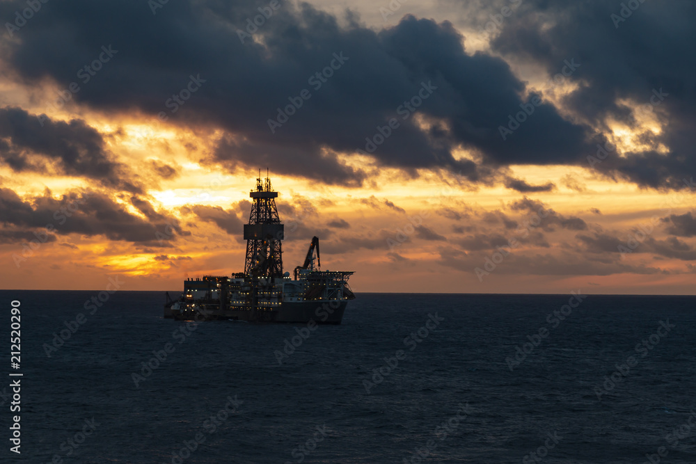 Sunrise over the oil towers and offshore oil rigs, MORE OPTIONS IN MY PORTFOLIO Sunrise over the oil towers and offshore oil rigs, MORE OPTIONS IN MY PORTFOLIO