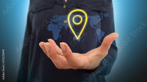 Businesswoman on blurred background holding hand localisation map over world map hologram
