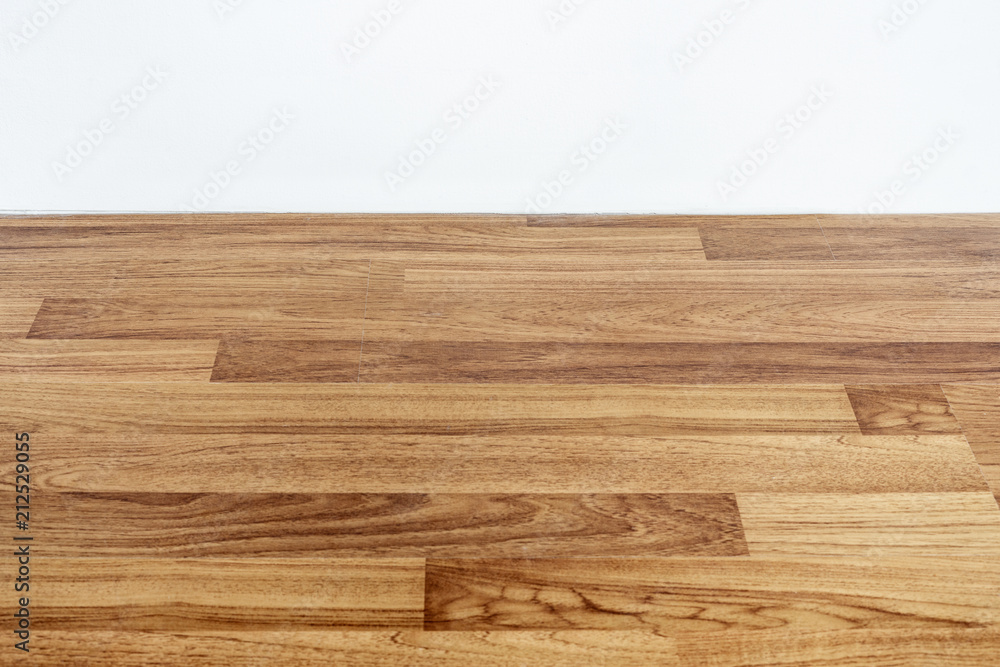 Laminated wood floor with white wall Laminated wood floor with white wall