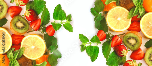 citrus fruits and strawberries on white background