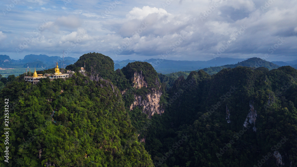 Buddha on the top Mountain of Wat Tham Seua (Tiger Cae) , Krabi,Thailand Buddha on the top Mountain of Wat Tham Seua (Tiger Cae) , Krabi,Thailand