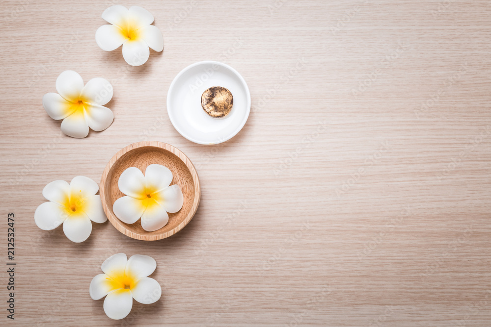 Obraz premium Frangipani flowers on white background. Concept for spa background