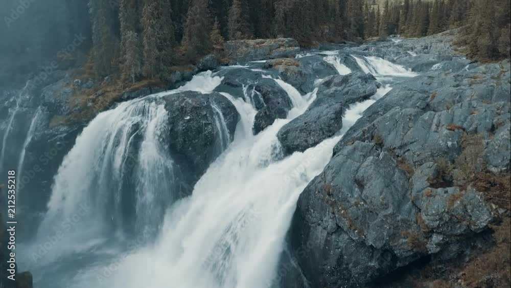 Waterfall in Norway, between mountains Waterfall in Norway, between mountains