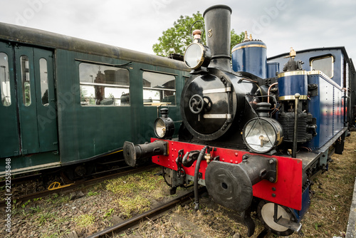 old steam train with a large oil lamp