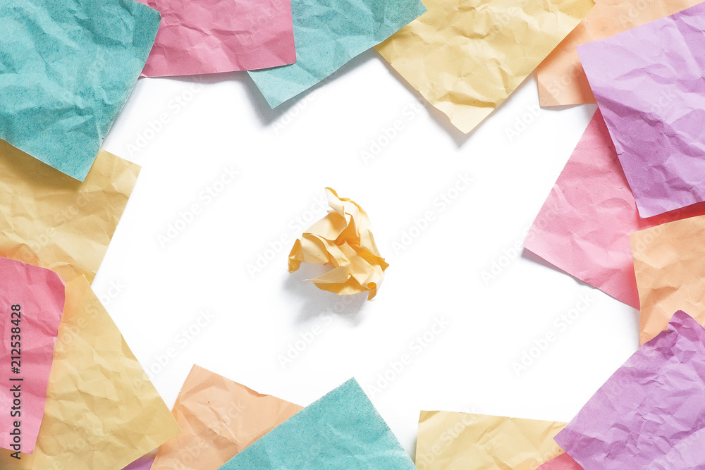 Framed Background of many colored crumpled reminder notes Framed Background of many colored crumpled reminder notes
