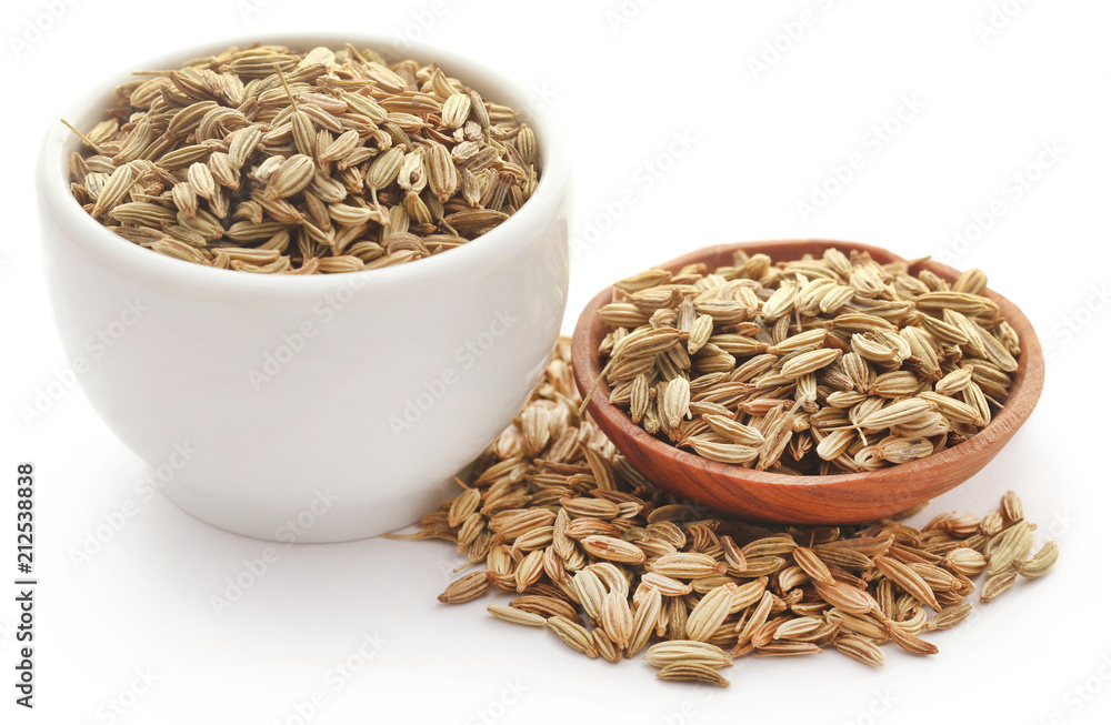 Fennel seeds over white background Fennel seeds over white background