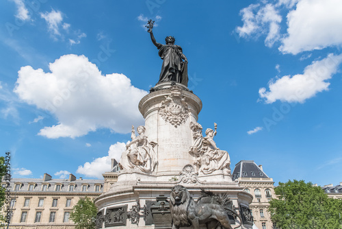 Paris, the beautiful Republic place, in the center, typical buildings in background 