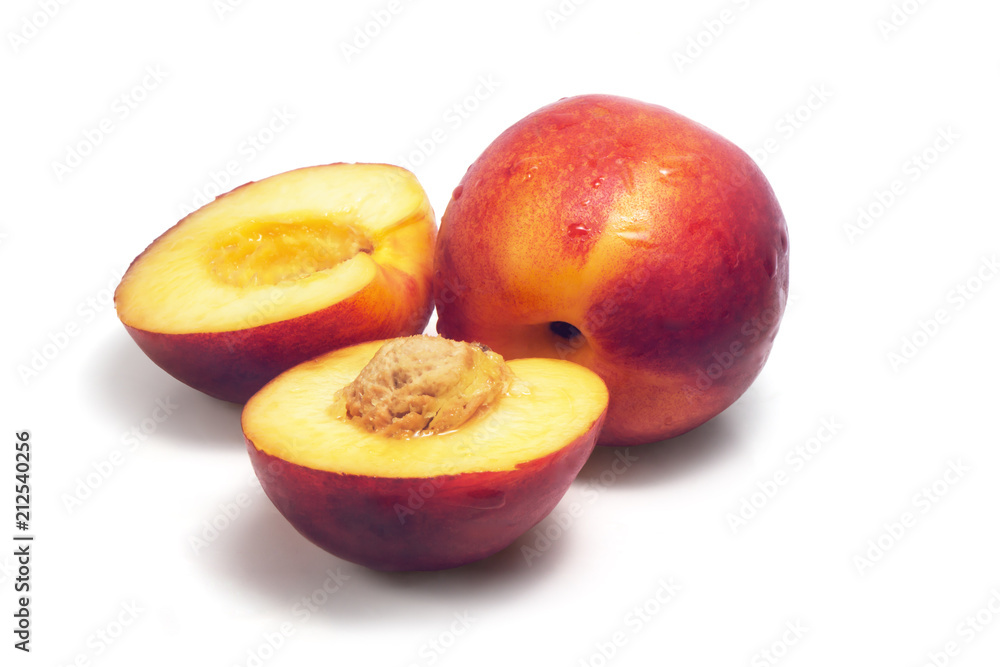 Group of fresh nectarines covered with water drops isolated on white background Group of fresh nectarines covered with water drops isolated on white background