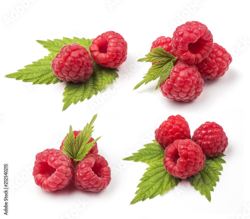 Set of four compositions of fresh red raspberries with green leaves isolated on white background