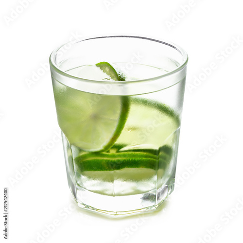 Lemon drink whit lime slices isolated on a white background.