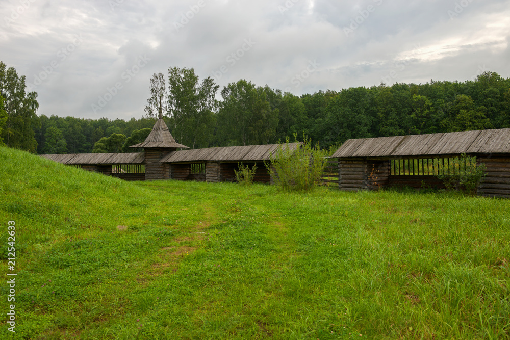 RUSSIA, SAINT PETERSBURG - AUGUST 18, 2017: An ancient fence in the estate Bogoslovka RUSSIA, SAINT PETERSBURG - AUGUST 18, 2017: An ancient fence in the estate Bogoslovka