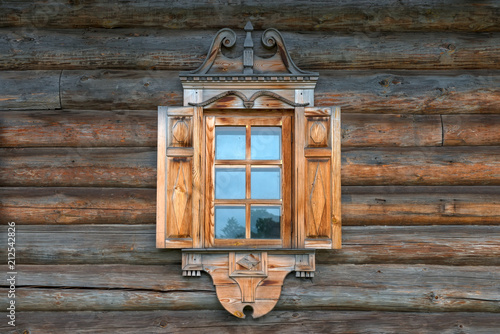 RUSSIA, SAINT PETERSBURG - AUGUST 18, 2017: Window with laths on the reconstructed house of merchant Kostin from Zaonezhye in the estate Bogoslovka. Building of 1871 photo