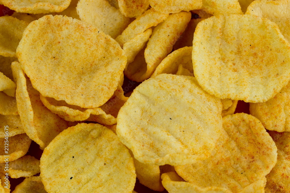 Potato chips background. Food texture Potato chips background. Food texture