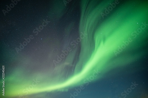 Foto Beautiful Northern lights, Aurora borealis dancing on night sky
