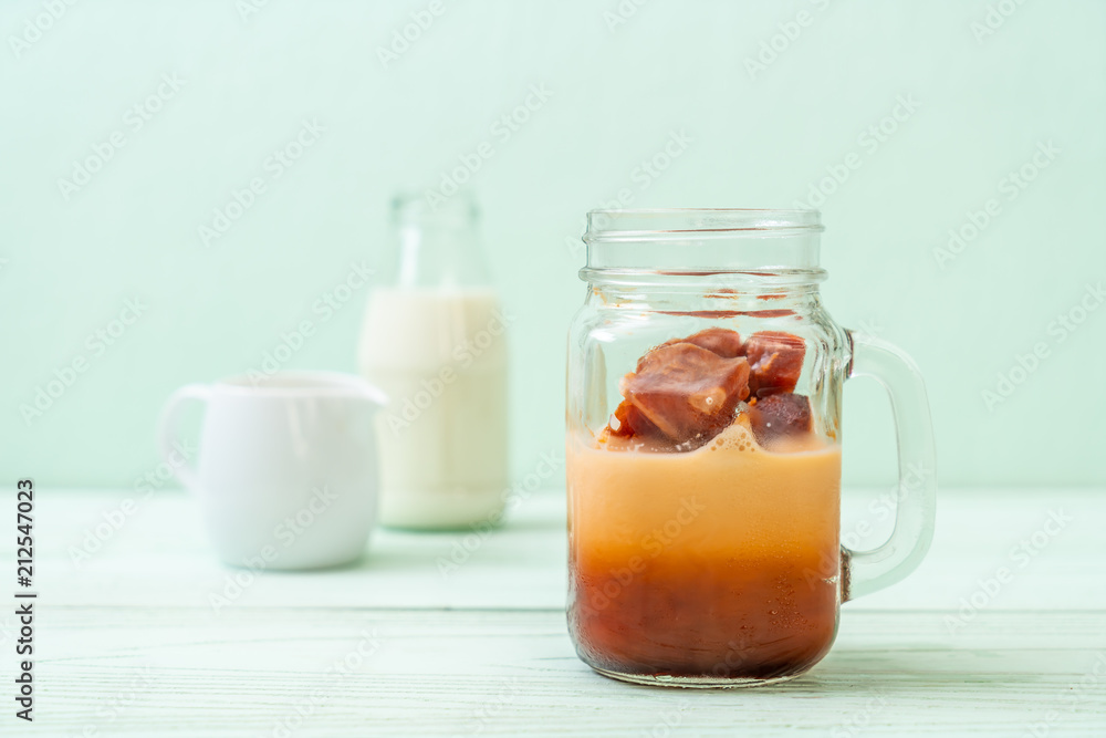 Thai tea ice cube with milk Thai tea ice cube with milk
