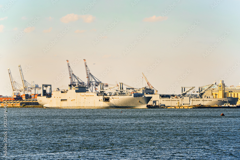 Commercial sea ships, dry cargo ships in a Hudson Gulf. New York, USA.