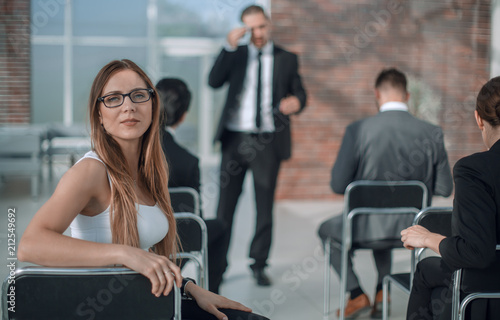 young businesswoman sitting in a meeting room