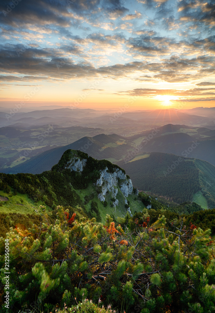 Obraz premium Sunrise on mountain at summer