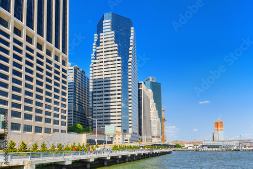 Lower Manhattan.Financial capital of America is New York City with tourists on the street.