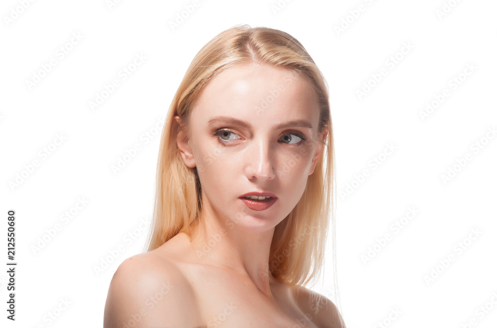 Portrait of a beautiful blonde on a white background. Portrait of a beautiful blonde on a white background.