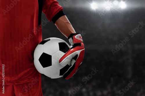 Soccer goalkeeper holding soccer ball © fotokitas