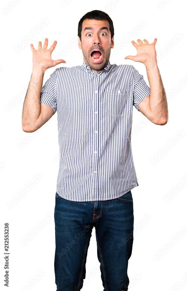 Handsome man making surprise gesture on isolated white background Handsome man making surprise gesture on isolated white background