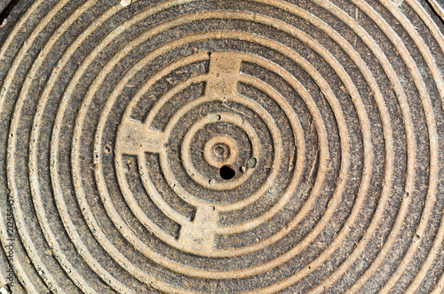 concentric round texture cast-iron hatch cover of brown rusty co