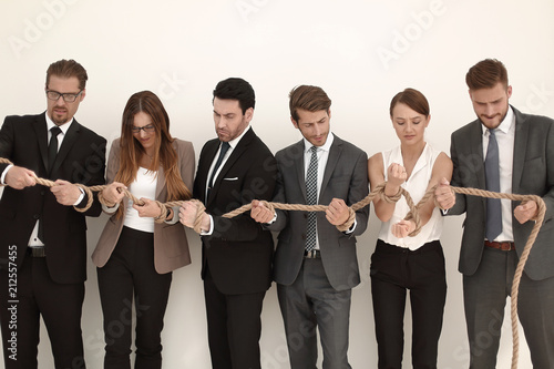 group of young people tied with a strong rope