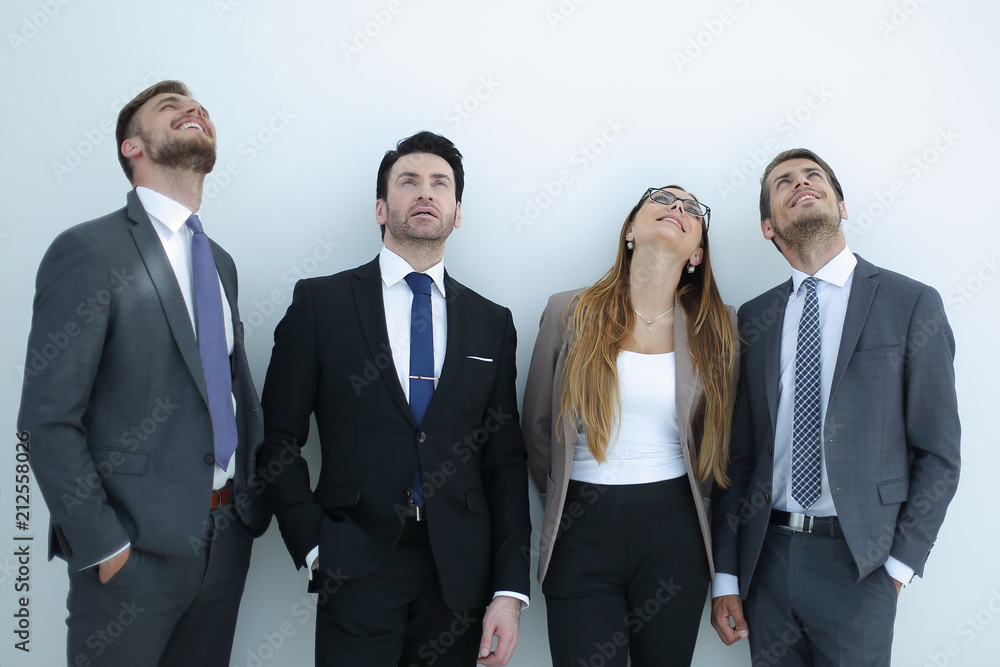 group of business people looking up at a copy space group of business people looking up at a copy space