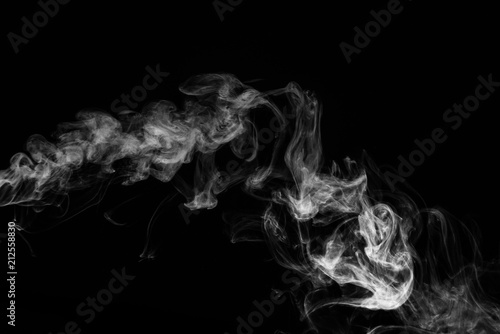 White smoke isolated on black background.