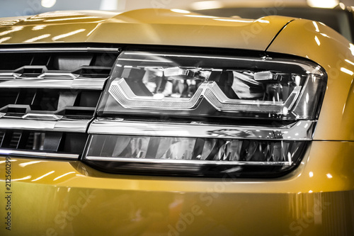 headlight of large SUV modern car with led and xenon optics © Xristoforov