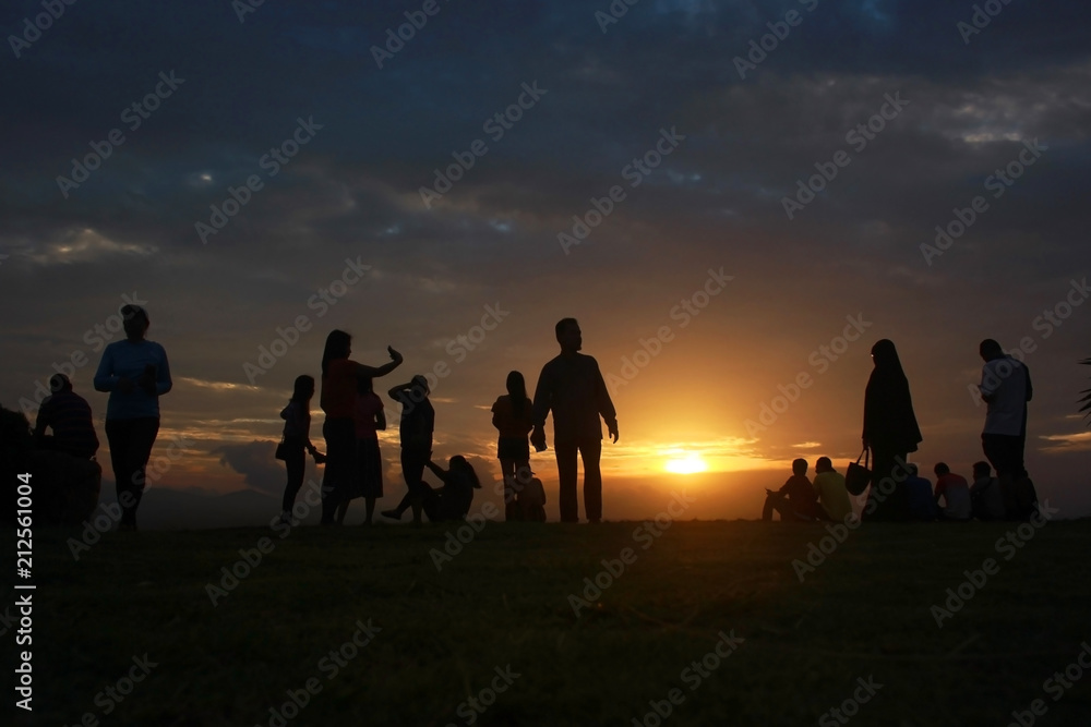 June 6, 2018, Hat Yai, Songkhla Province. Silhouet people watch the mountain view to see the sun and the beautiful sky.