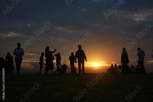 June 6, 2018, Hat Yai, Songkhla Province. Silhouet people watch the mountain view to see the sun and the beautiful sky. © Siriporn