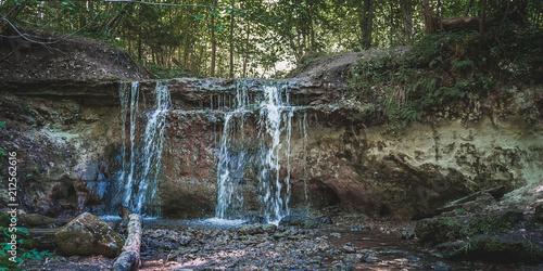 Dauda waterfall in dry summer .Small waterfall in Gauja national park. Latvia. photo