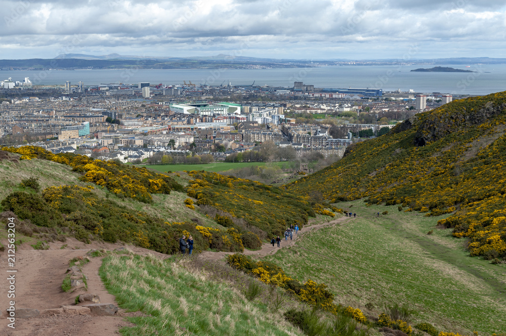View of Edinburgh city towards coastal area of the North Sea from Arthur’s Seat, the highest point in Edinburgh located at Holyrood Park, Scotland, UK