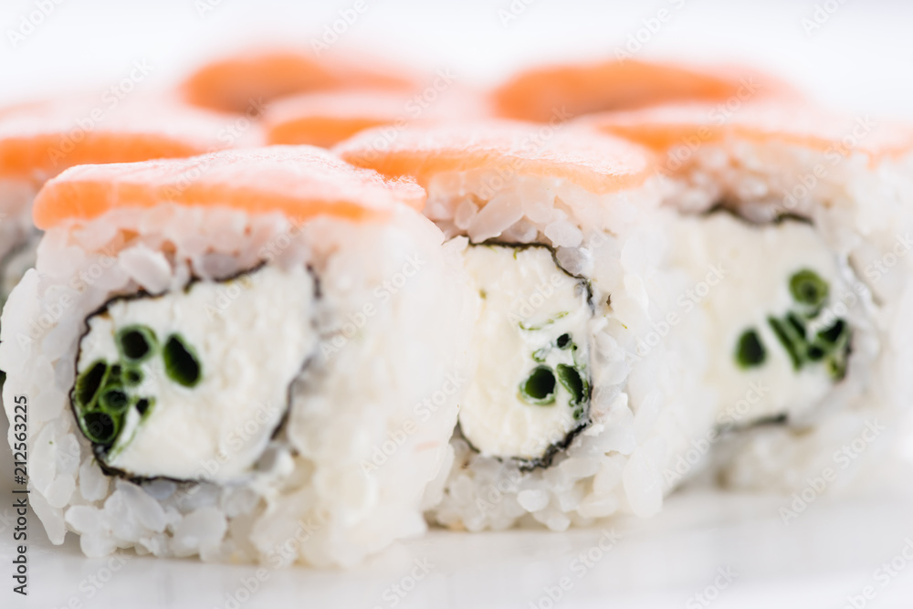 Sushi set and composition at white background. Japanese food restaurant, sushi maki gunkan roll plate or platter set. Sushi set and composition at white background. Japanese food restaurant, sushi maki gunkan roll plate or platter set.