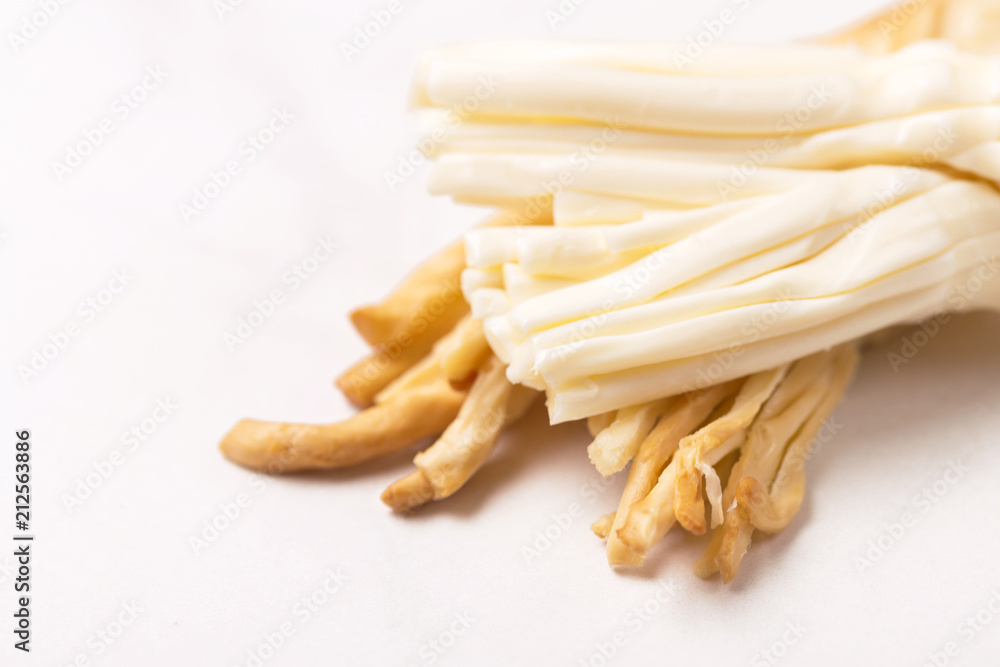 Healthy Snack. Smoked string cheese. Kobarcik. Selective focus Healthy Snack. Smoked string cheese. Kobarcik. Selective focus