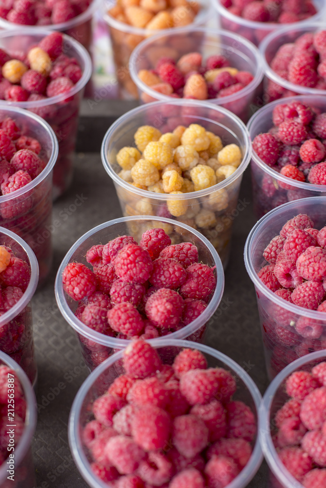 fresh red and yellow raspberry abstract fruit colorful pattern texture background