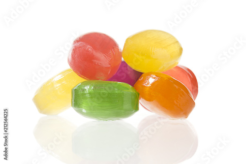 Mixed colorful candy on white background.