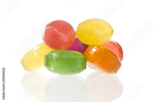 Mixed colorful candy on white background. photo